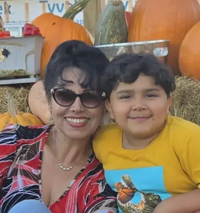 Mother and child with pumpkins